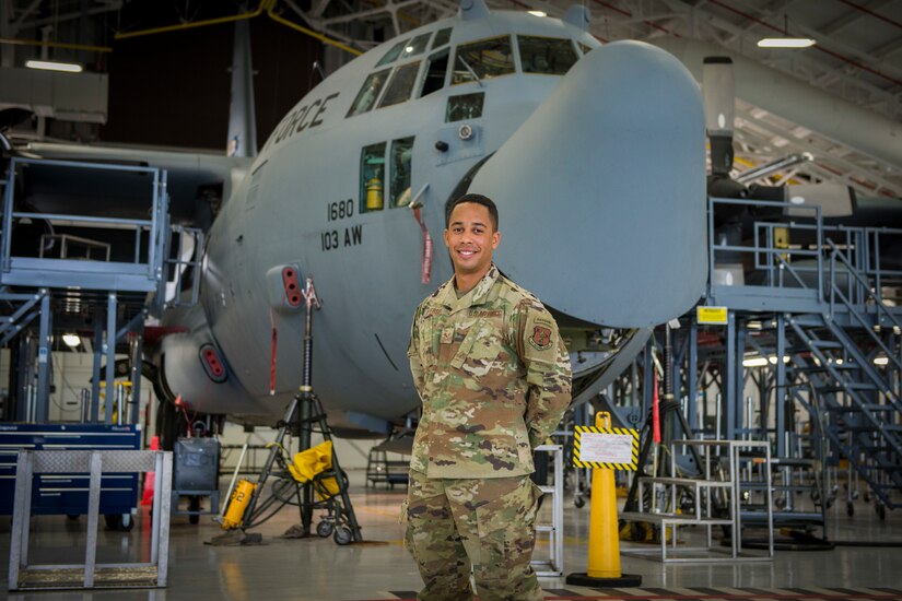 Senior Airman Jonathan Petersen, 103rd Maintenance Squadron electrical and environmental systems specialist, in front of a C-130H Hercules at Bradley Air National Guard Base in East Granby, Connecticut, March 16, 2021. Petersen attended U.S. Army Ranger School through the Air National Guard’s Enlisted Development Opportunities program, and was the only Air National Guardsman in his graduating class, which completed Feb. 5.