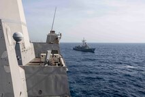 210314-N-JC800-1400 RED SEA (March 14, 2021) – U.S. Navy Capt. Dave Kurtz, commanding officer of amphibious transport dock ship USS Somerset (LPD 25), observes Egyptian guided-missile frigate ENS Sharm El Sheikh (FFG 901) during a passing exercise in the Red Sea, March 14. Somerset, part of the Makin island Amphibious Ready Group, and the 15th Marine Expeditionary Unit are deployed to the U.S. 5th Fleet area of operations in support of naval operations to ensure maritime stability and security in the Central Region, connecting the Mediterranean and Pacific through the western Indian Ocean and three strategic choke points. (U.S. Navy photo by Mass Communication Specialist 2nd Class Heath Zeigler)