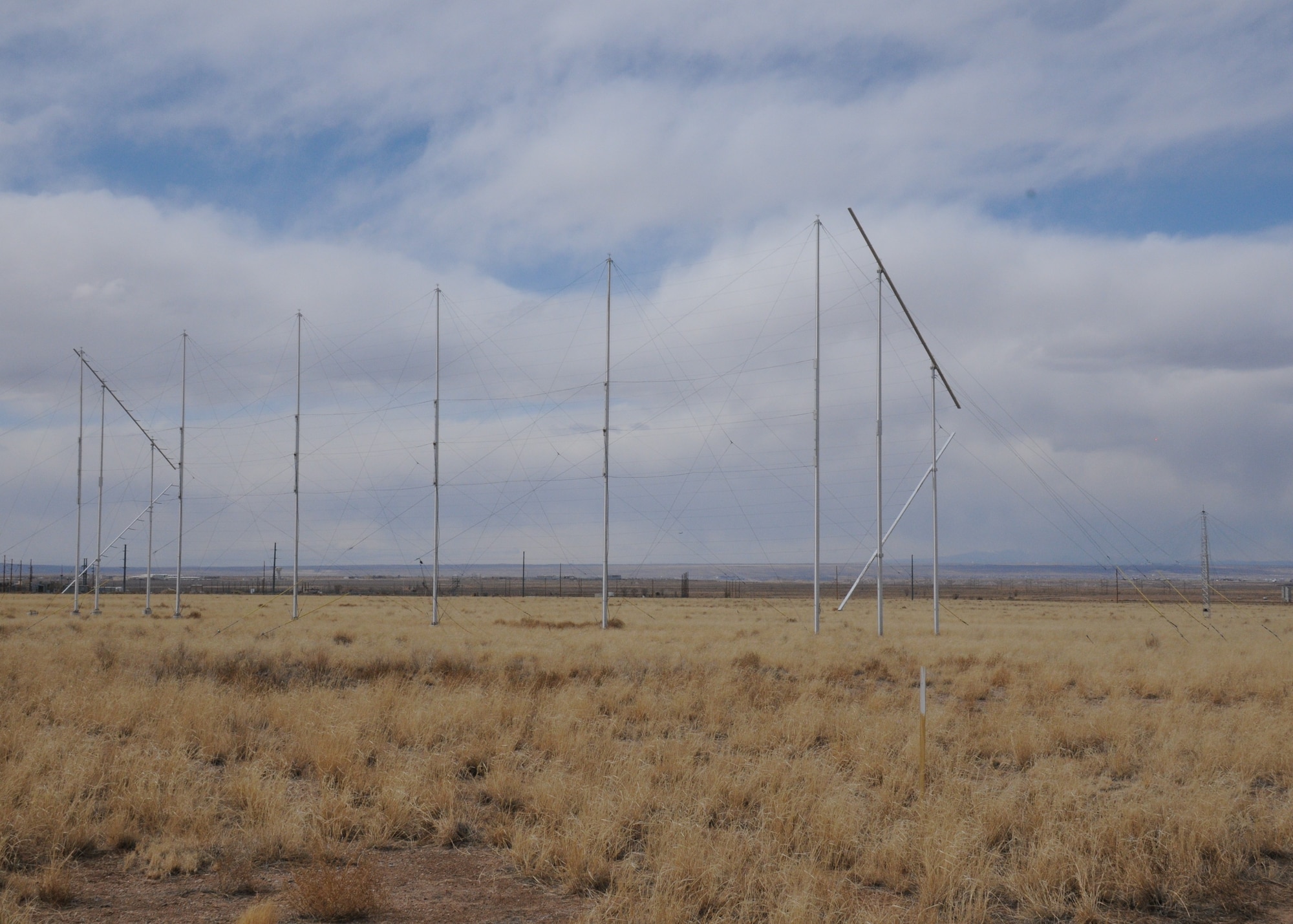 The Air Force Research Laboratory’s Prototype High Frequency phased antenna array for radar monitoring of the space environment and for investigations of long distance radio-wave propagation conditions. AFRL broke ground March 16 on a new facility called the Skywave Technology Laboratory that will be constructed on Kirtland AFB, N.M. at the site where several of their propagation antennas already exist. (U.S. Air Force photo/John Cochran)