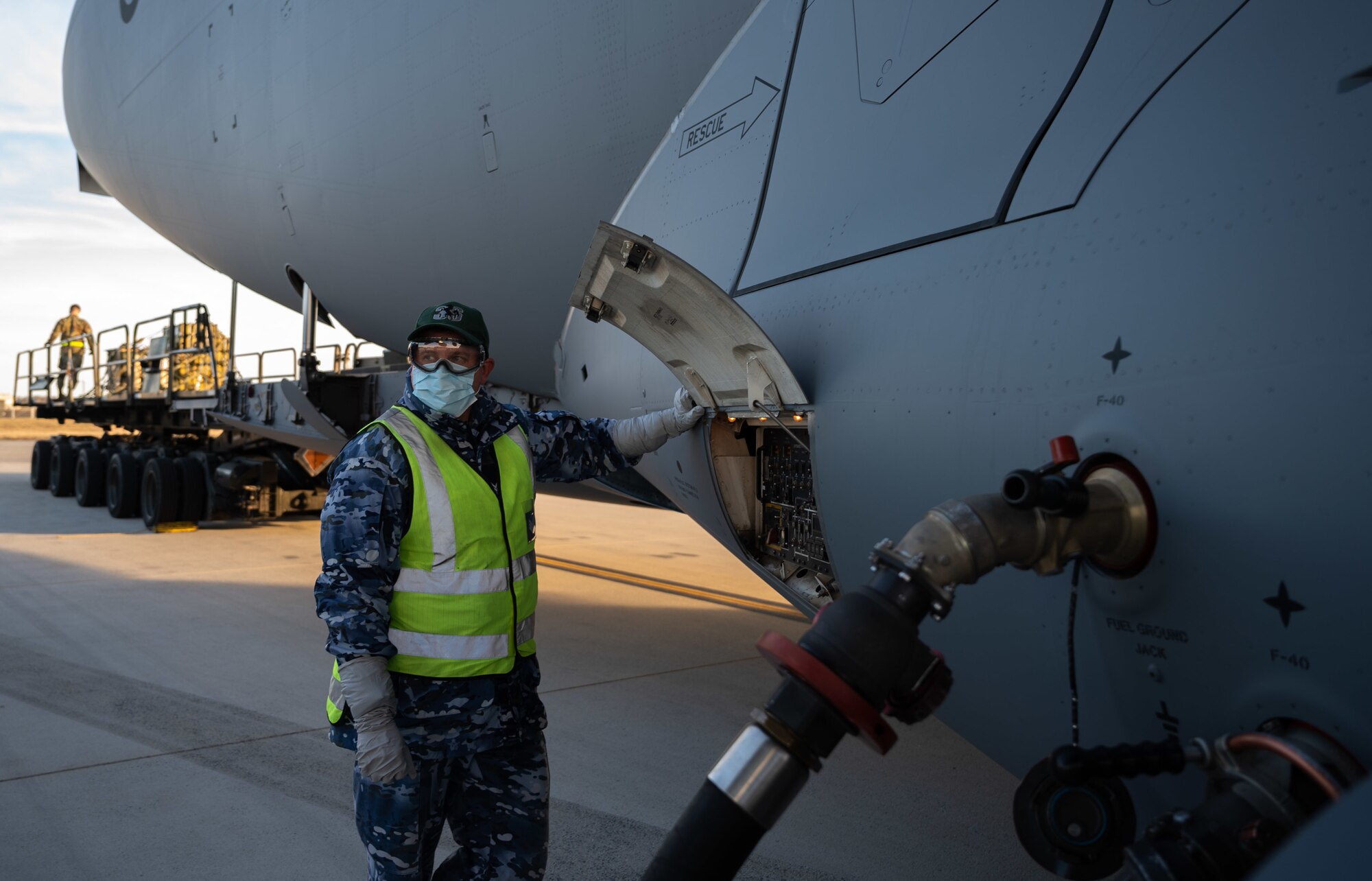 Sgt. Symon Brady, Royal Australian Air Force 36th Squadron aeronautical life support fitter, oversees fueling of a RAAF C-17 Globemaster III at Dover Air Force Base, Delaware, March 13, 2021. The U.S. and Australia maintain a robust relationship underpinned by shared democratic values, common interests and cultural bonds. The U.S.-Australia alliance is an anchor for peace and stability in the Indo-Pacific region and around the world. (U.S. Air Force photo by Airman 1st Class Faith Schaefer)