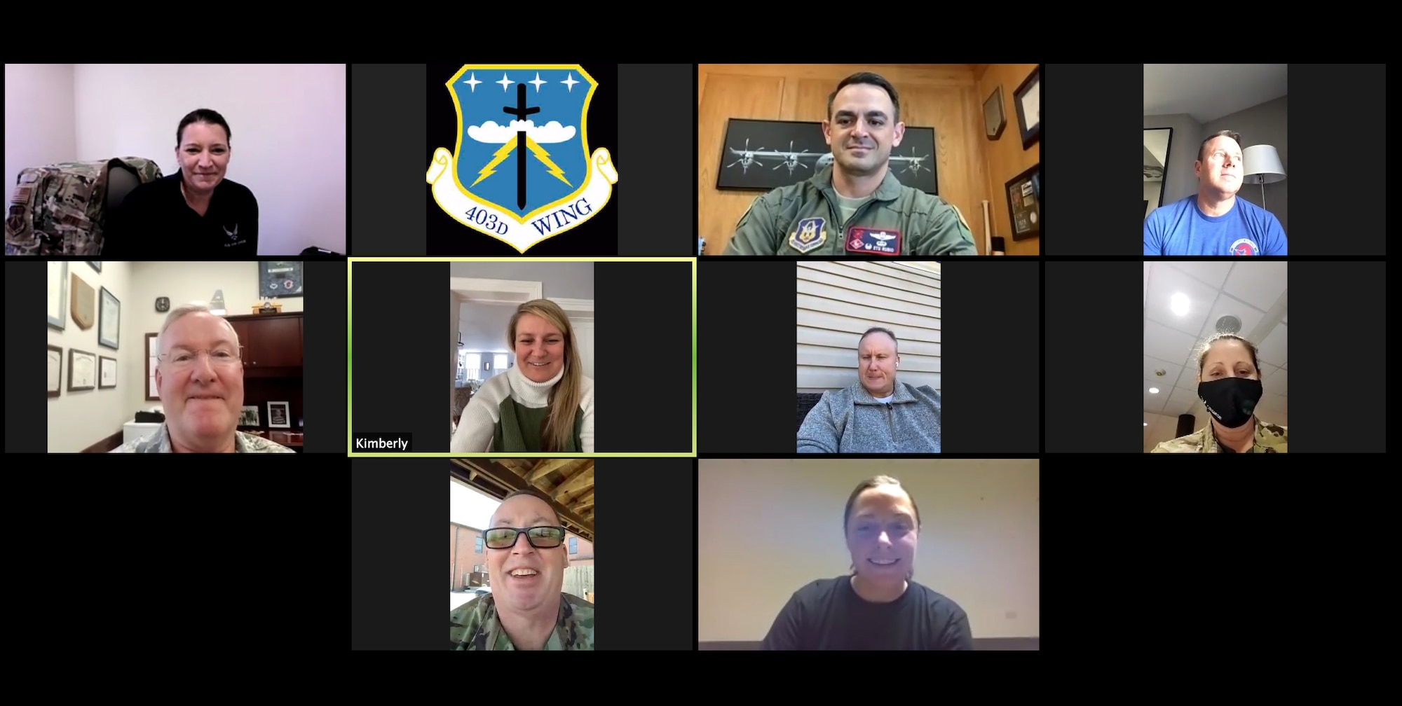 Members of the the 403rd Wing Command Staff, the 403rd Wing Operations Group, and the 12th Operational Weather Flight took time to video conference deployed member, Master Sgt. Sheena Tugwell, 12th OWF unit training manager, on being awarded the 22nd Air Force Non-Commissioned Officer of the Year. Tugwell will move on to compete at the Air Force Reserve Command level. (U.S. Air Force photo by Jessica L. Kendziorek)