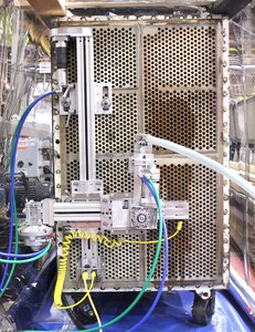 A remote-operated, three-axis hydro-lance indexer is mounted in the tubes of a mock heat exchanger during recent vendor provided training inside Building 107 at Puget Sound Naval Shipyard & Intermediate Maintenance Facility in Bremerton, Washington. (PSNS & IMF photo)