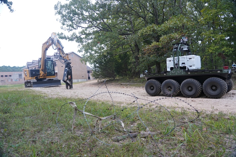 The U.S. Army Engineer Research and Development Center demonstrates unmanned capabilities for combat engineers during the Maneuver Support, Sustainment, Protection Integration Experiment-2020 (MSSPIX20) at Fort Leonard Wood, Missouri, Sept. 16, 2020. During the MSSPIX20 training exercise, these two systems demonstrated a near real-time 3D mapping environment and unmanned reduction of an obstacle with the teleoperated 8-ton hydraulic excavator and the Robotics for Engineer Operations fully autonomous site characterization and mapping platforms. (U.S. Army Corps of Engineers photo)