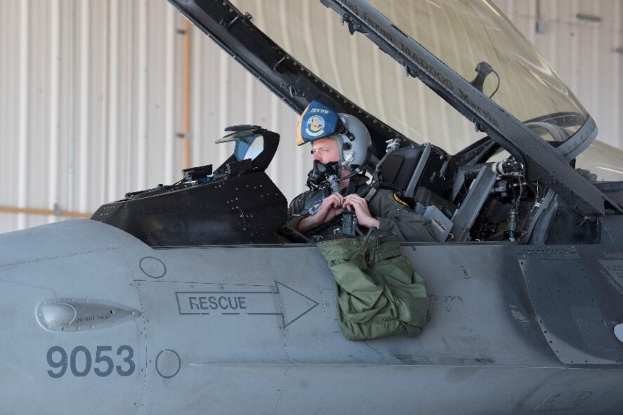 Capt. Michael Dreher, 311th Fighter Squadron pilot straps into F-16 Viper Aircraft 9053, March 2, 2021, on Holloman Air Force Base, New Mexico. The 849th Aircraft Maintenance Squadron spent 22 months rebuilding the aircraft to return to operational status. (U.S. Air Force photo by Airman 1st Class Jessica Sanchez)