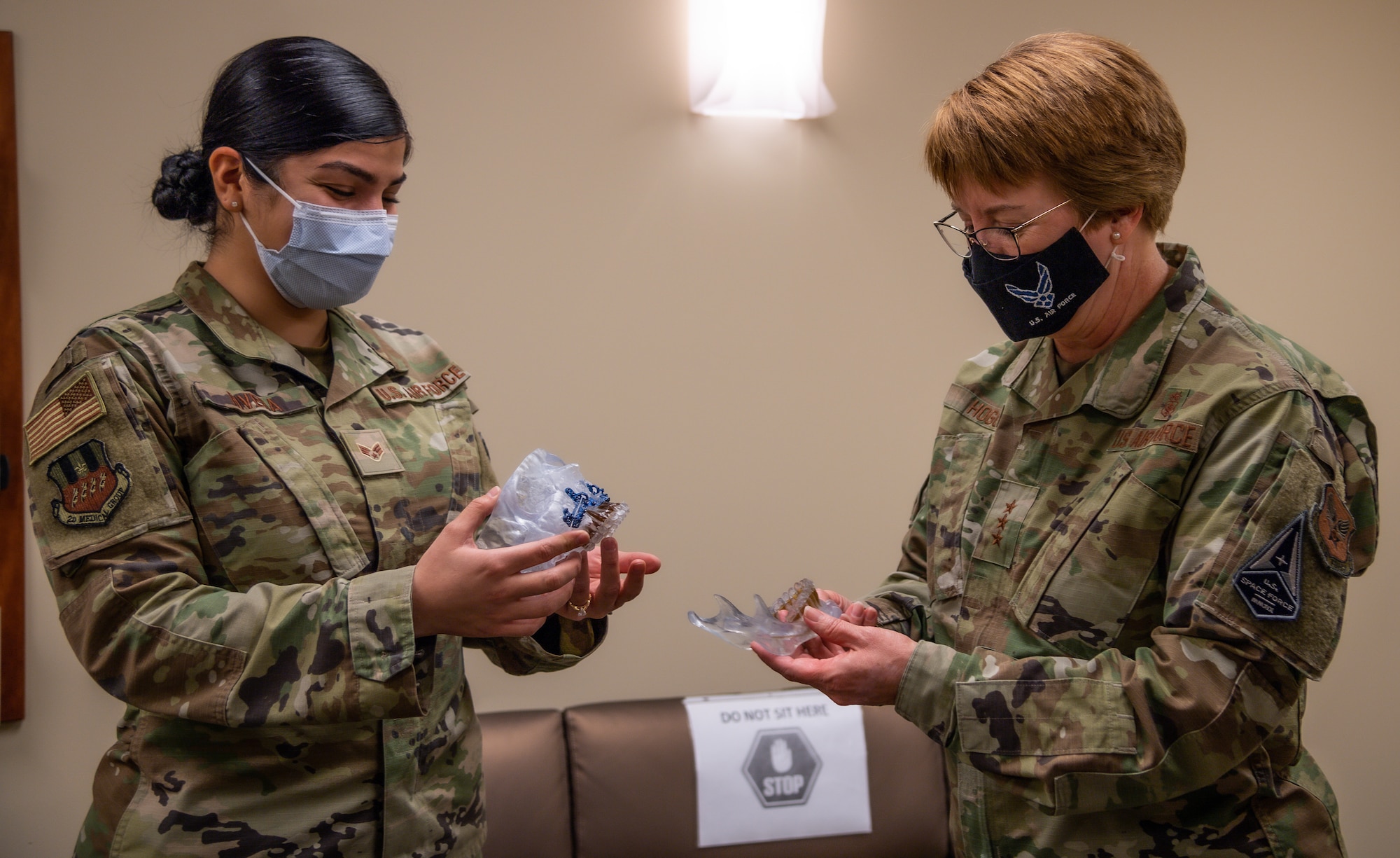 Lt. Gen. Dorothy Hogg, U.S. Air Force Surgeon General, and Chief Master Sgt. Dawn Kolczynski, Office of the Surgeon General medical enlisted force and enlisted corps chief, visit the Tech. Sgt. Joshua L. Kidd Weapons Load Training Facility at Barksdale Air Force Base, Louisiana, March 10, 2021.