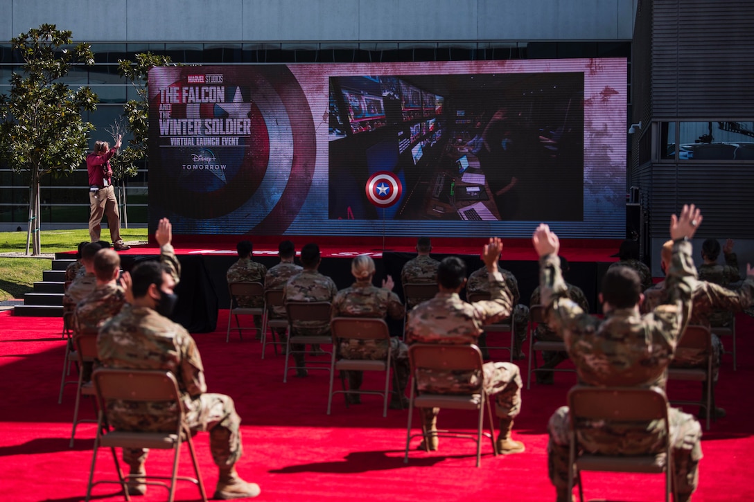 Airmen and Guardians from the Space and Missile Systems Center and the 61st Air Base Group get ready to watch the premier episode of the Falcon and The Winter Soldier during a virtual launch event at Los Angeles Air Force Base, Calif., March 6, 2021. The cast - Anthony Mackie, Sebastian Stan, Emily VanCamp, Wyatt Russell and Daniel Brühl, answered questions about the show, shared behind-the-scenes facts and expressed their appreciation for support from the U.S. Air and Space Force during filming. (U.S. Space Force photo by Staff Sgt. Luke Kitterman)