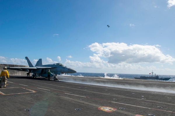 210317-N-HS716-1151 MEDITERRANEAN SEA (March 17, 2021) The Turkish frigate TCG Gemlik (F 492) sails alongside the Nimitz-class aircraft carrier USS Dwight D. Eisenhower (CVN 69), during flight operations in the Mediterranean Sea, March 17, 2021. The IKE Carrier Strike Group is on a scheduled deployment in the U.S. Sixth Fleet area of operations in support of U.S. national interests and security in Europe and Africa. (U.S. Navy photo by Mass Communication Specialist 3rd Class Jairus P. Bailey/Released)