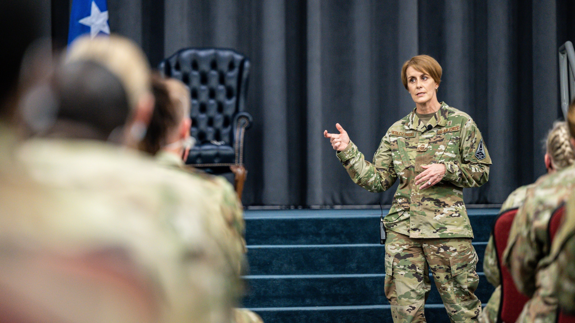 Chief Master Sgt. Dawn Kolczynski, Office of the Surgeon General medical enlisted force and enlisted corps chief, speaks during an all-call at Barksdale Air Force Base, Louisiana, March 10, 2021