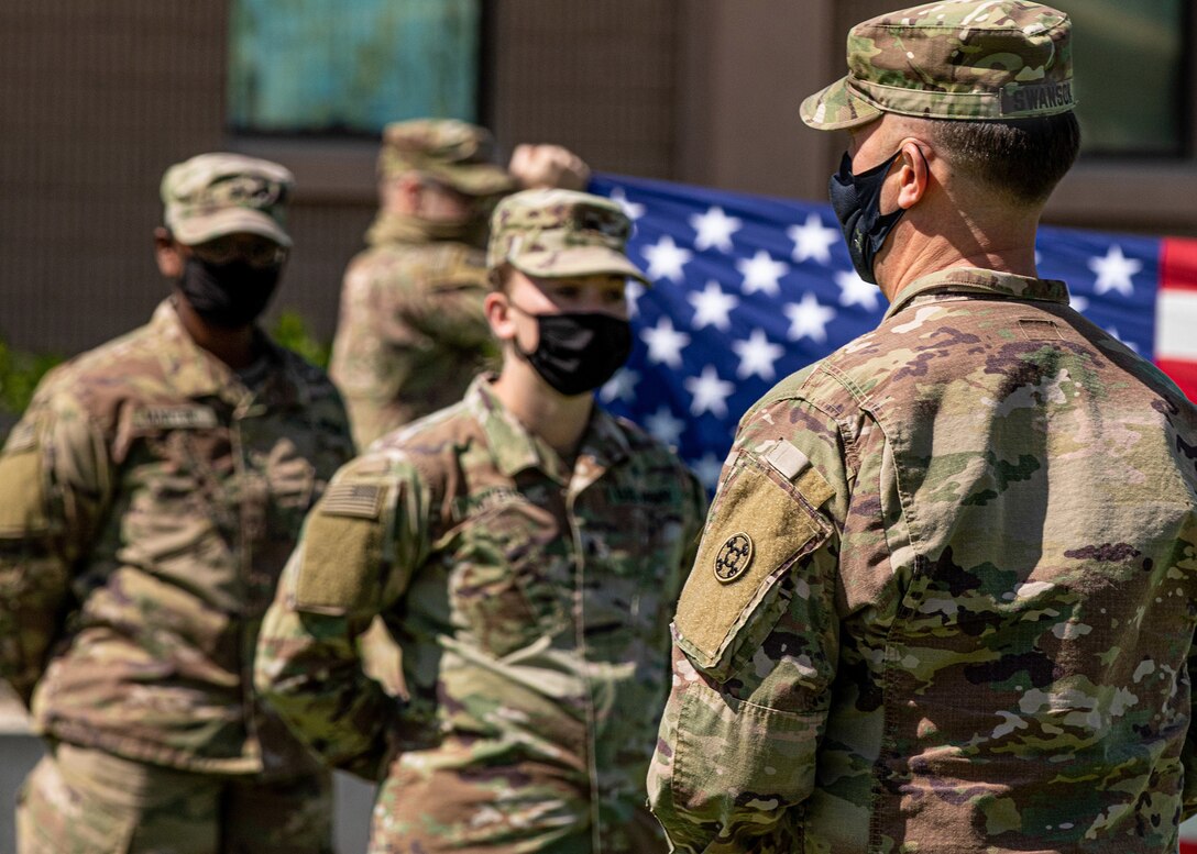 Brig. Gen. Swanson reenlists Soldiers deployed to Camp Arifjan, Kuwait