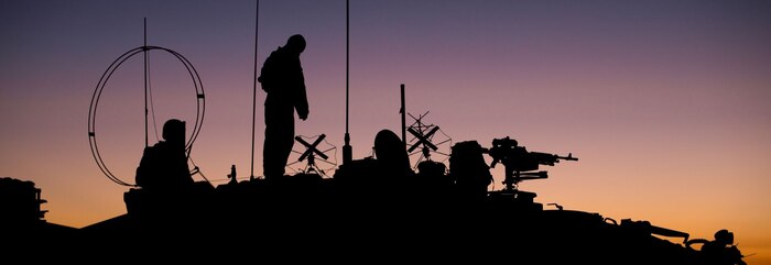 201013-M-PQ459-2289 MARINE CORPS BASE CAMP PENDLETON, Calif. (Oct. 13, 2020) – U.S. Marines with Light Armored Reconnaissance Detachment, Battalion Landing Team 1/4, 15th Marine Expeditionary Unit, establish communications from a light armored vehicle in preparation for a forward arming and refueling point operation. The Makin Island Amphibious Ready Group and the 15th MEU are currently conducting at-sea training events in the U.S. 3rd Fleet area of operations. (U.S. Marine Corps photo by Sgt. Sarah Stegall)