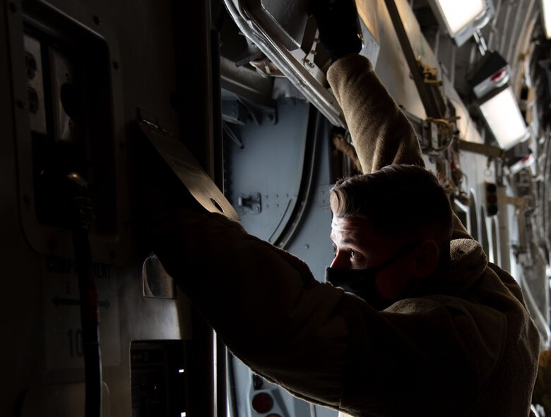 Airman looks at camera.