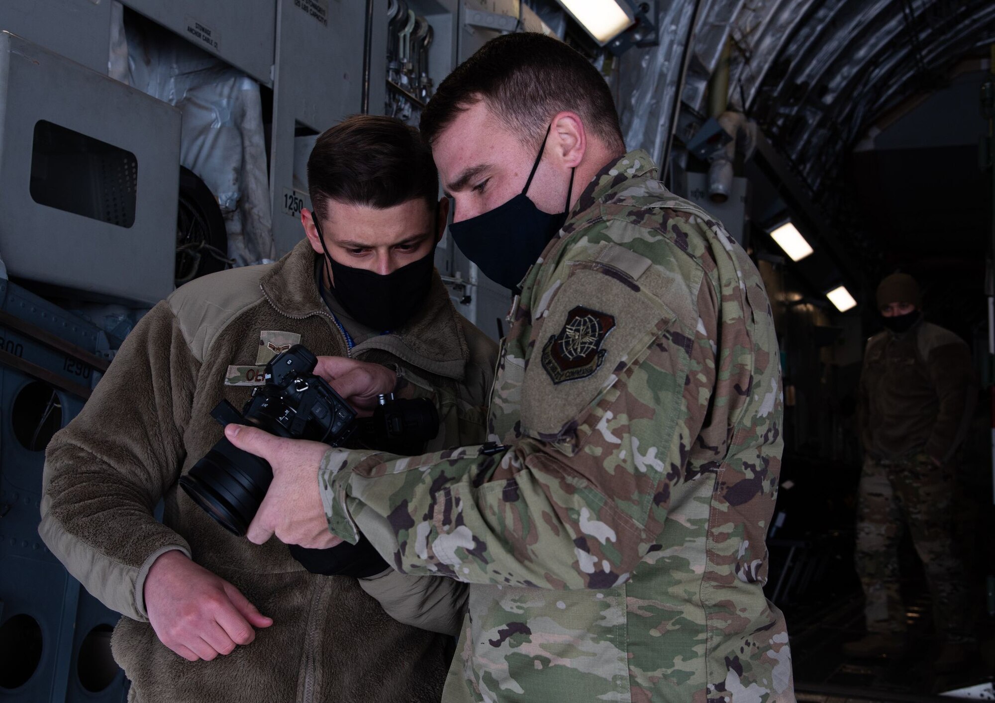 Airmen looks at camera.
