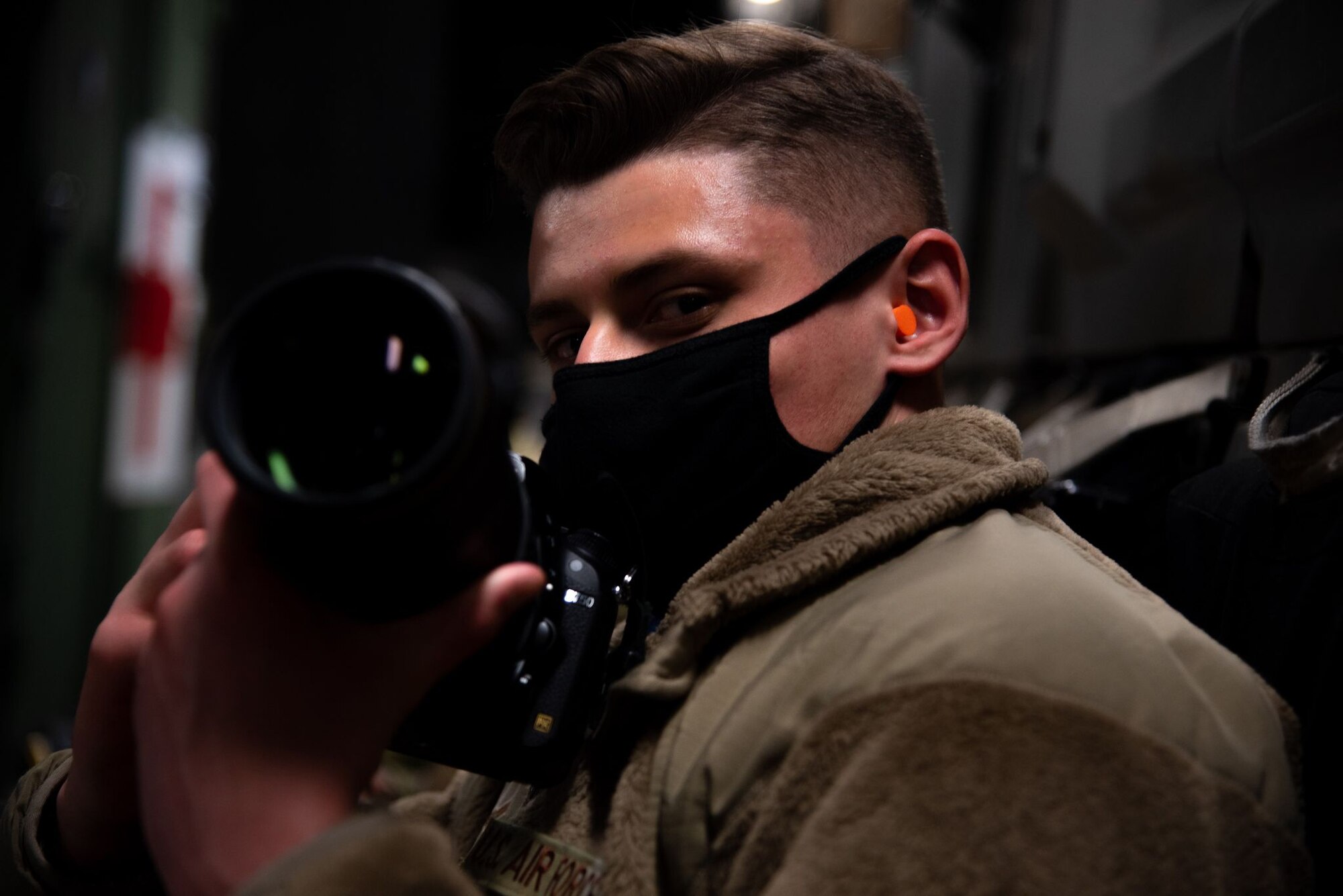 Airman looks at camera.