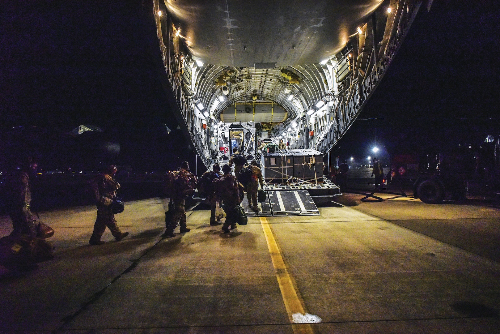 Airmen deployed a Transport Isolation System for the first time in the Indo-Pacific to safely transport a COVID-19 patient. (U.S. Indo-Pacific Command, July 17, 2020)