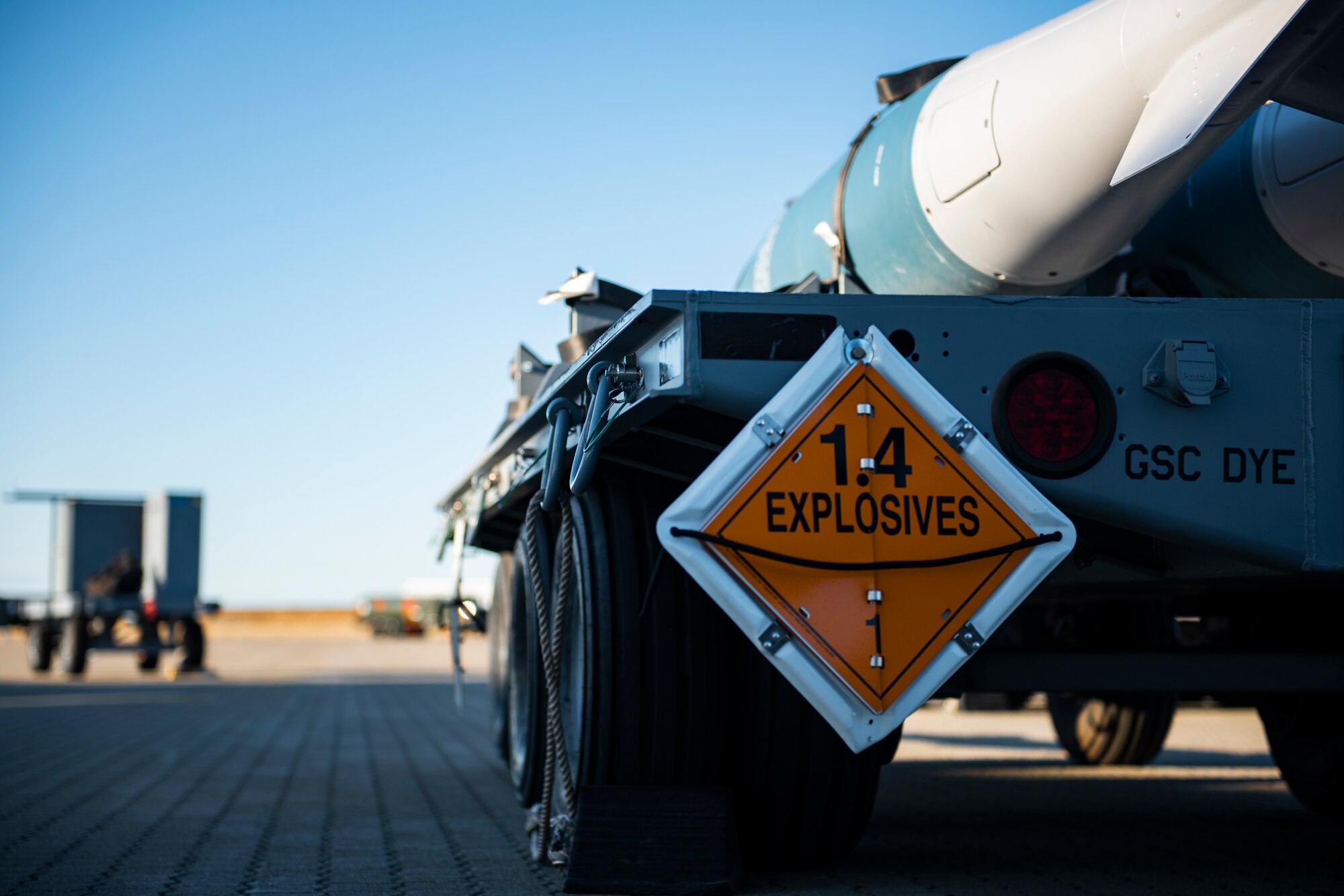 A bomb cart carrying bomb dummy units sits on the flight line at Ørland Air Force Station, Norway, March 13, 2021. The 9th Expeditionary Bomb Squadron deployed to Ørland AFS, Norway, to conduct a series of Bomber Task Force Europe training missions. (U.S. Air Force photos by Airman 1st Class Colin Hollowell)