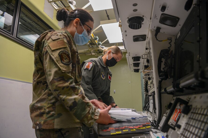 1st Lt. Janelle Hrycyk and 2nd Lt. April Hood, 740th Missile squadron missileers, review missile procedures in the 91 Operations Support Squadron missile procedure trainer on March 8, 2021, at Minot Air Force Base, North Dakota.