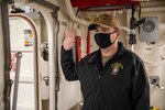 Senior Chief Petty Officer Jason Cornelius, assigned to the San Antonio-class amphibious transport dock ship USS Arlington, recites the oath of office during extremism training, March 7, 2021.