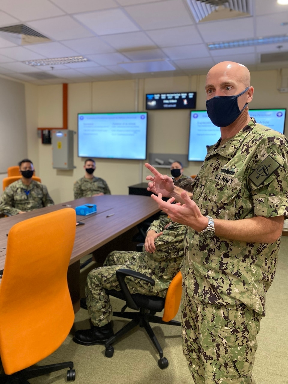 Capt. Tom Ogden, commodore of Destroyer Squadron Seven (DESRON 7), participates in a Navy-wide stand-down to address extremism in the ranks. DESRON 7 serves as the primary tactical and operational commander of littoral combat ships rotationally deployed to Southeast Asia, builds partnerships through training exercises and military-to-military engagements, and supports Expeditionary and Littoral warfighting commanders.