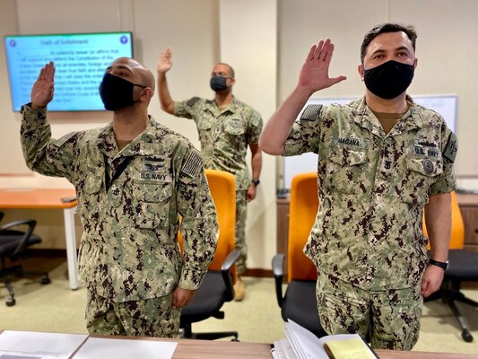 Chief Gas Turbine Systems Martin Thomas, left, Senior Chief Gas Turbine Systems Technician Mark Wiggan, center, and Master Chief Engineman Juan Magana, assigned to Commander, Destroyer Squadron Seven (DESRON 7), participate in a Navy-wide stand-down to address extremism in the ranks. DESRON 7 serves as the primary tactical and operational commander of littoral combat ships rotationally deployed to Southeast Asia, builds partnerships through training exercises and military-to-military engagements, and supports Expeditionary and Littoral warfighting commanders.