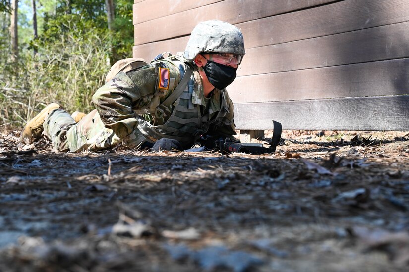 A U.S. Army Soldier prepares to throw a simulated hand grenade during a training exercise at Joint Base Langley-Eustis, Virginia, March 10, 2021.