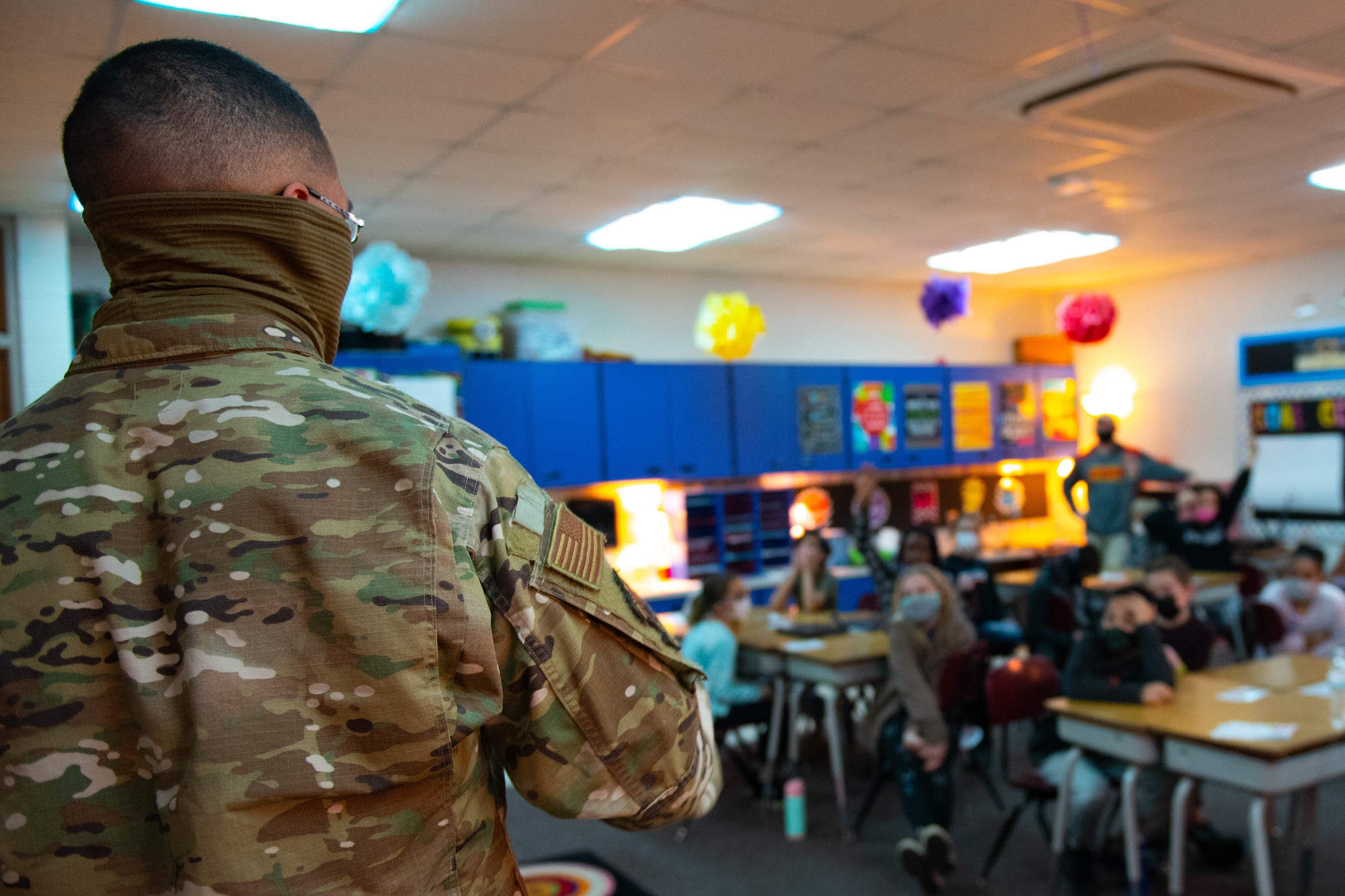 U.S. Air Force Airman 1st Class Dylan Wohlford, an installation entry controller assigned to the 509th Security Forces Squadron, speaks to a class of elementary students at Whiteman Air Force Base, Missouri, on Feb. 26, 2021. During the visit, students asked questions about the Air Force experience and lifestyle. (U.S. Air Force photo by Airman 1st Class Devan Halstead)