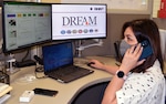 Nichole Carreon, a registered nurse with the Diabetes Remote Electronic Assisted Monitoring program, talks with a patient about their weekly glucose readings at the Military Health System Virtual Medical Center at Brooke Army Medical Center March 18.