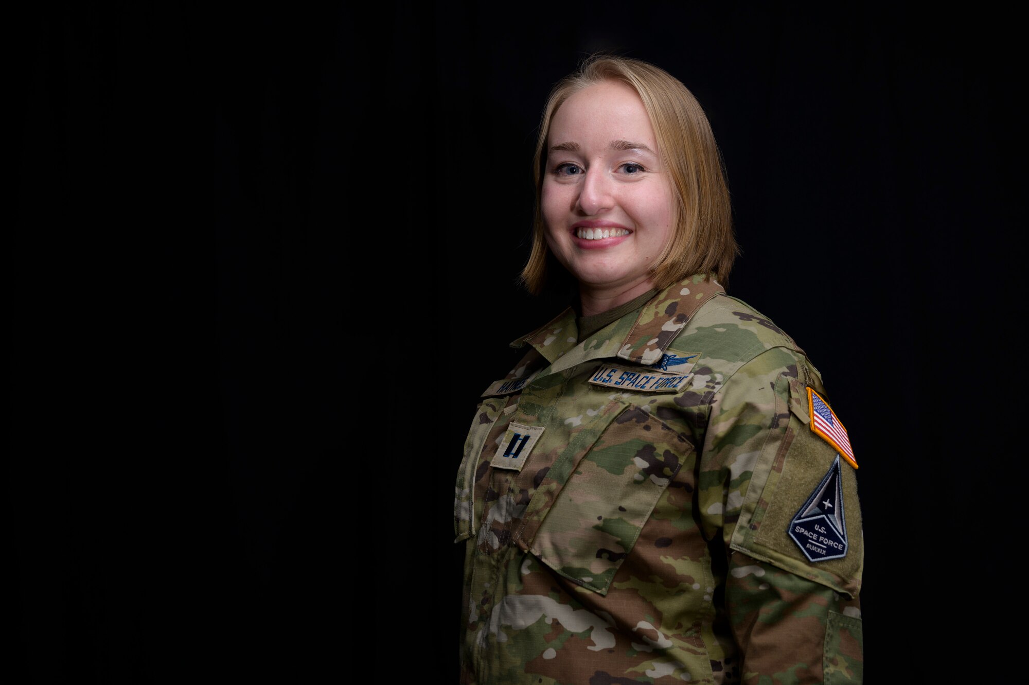 U.S. Space Forces Capt. Allyson Haynes, Space Delta 8 GPS staff instructor, discusses her background and interest at Schriever Air Force Base, Colorado, Feb. 11, 2021. Haynes shared her love of technology and engineering. ( U.S. Space Force Graphic by Paul Honnick)