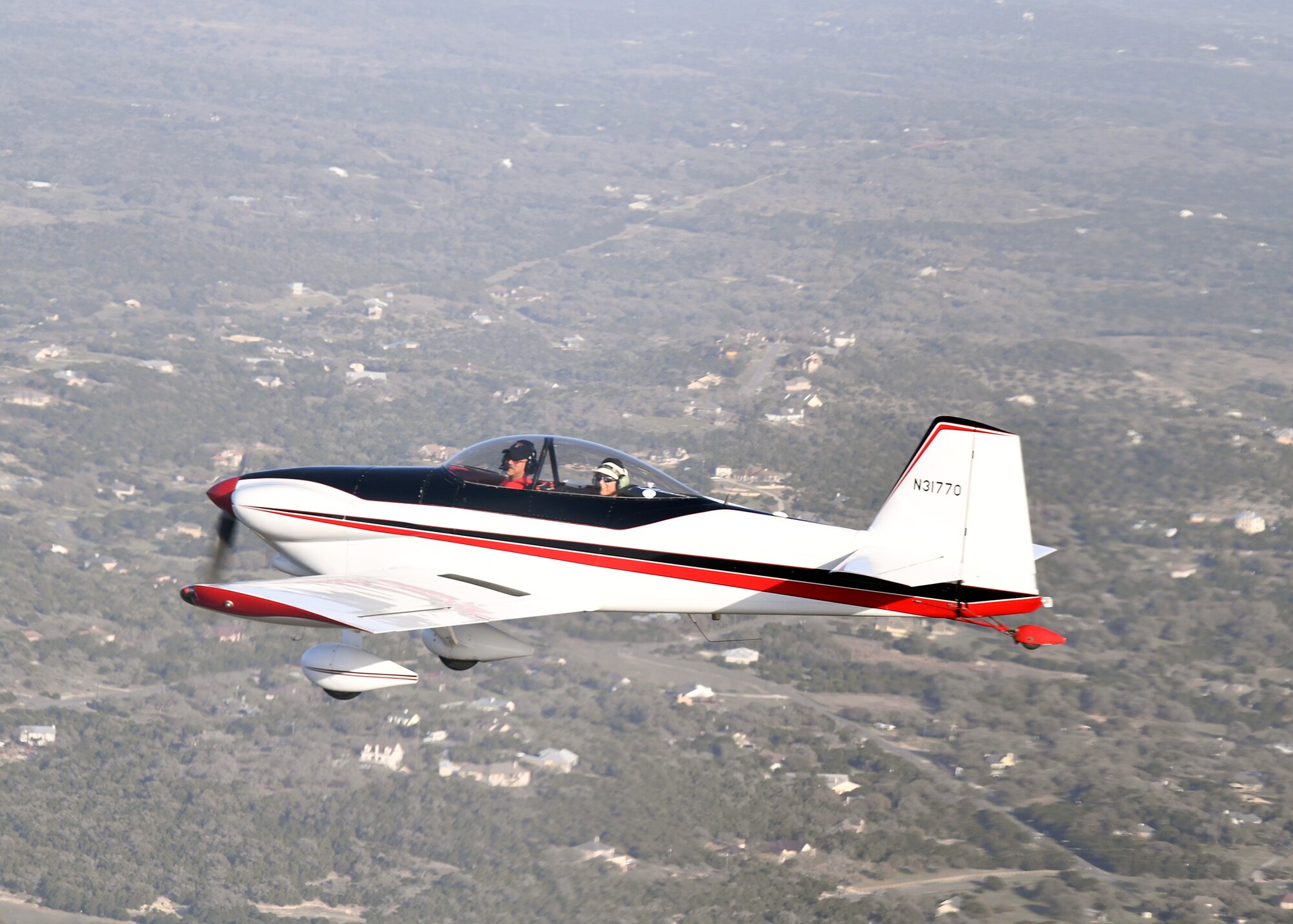 Maj. Cindy Piccirillo, 149th Fighter Wing director of inspections, flies over Bulverde, Texas, March 15, 2021, during a ride with Col. Raul Rosario, 149th FW commander, in an RV-4 airplane.