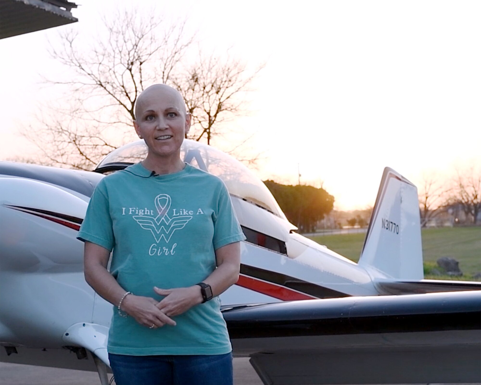 Maj. Cindy Piccirillo, 149th Fighter Wing director of inspections, discusses her fight to win against cancer after returning from an aircraft ride in RV-4 over Bulverde, Texas, March 15, 2021.