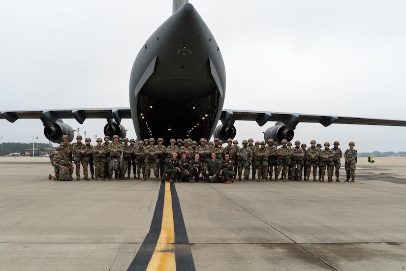 Women assigned to the 82nd Airborne Division, Pope Army Airfield, N.C., and 437th Airlift Wing, Joint Base Charleston, S.C., participated in an all-female flight in commemoration of Women’s History Month, March 17, 2021. The flight included 80 female paratroopers who boarded two C-17s with all-female crews to perform a jump. Due to weather constraints, the paratroopers were unable to complete their jump. (U.S. Air Force photo by Staff Sgt. Rachel Pye)