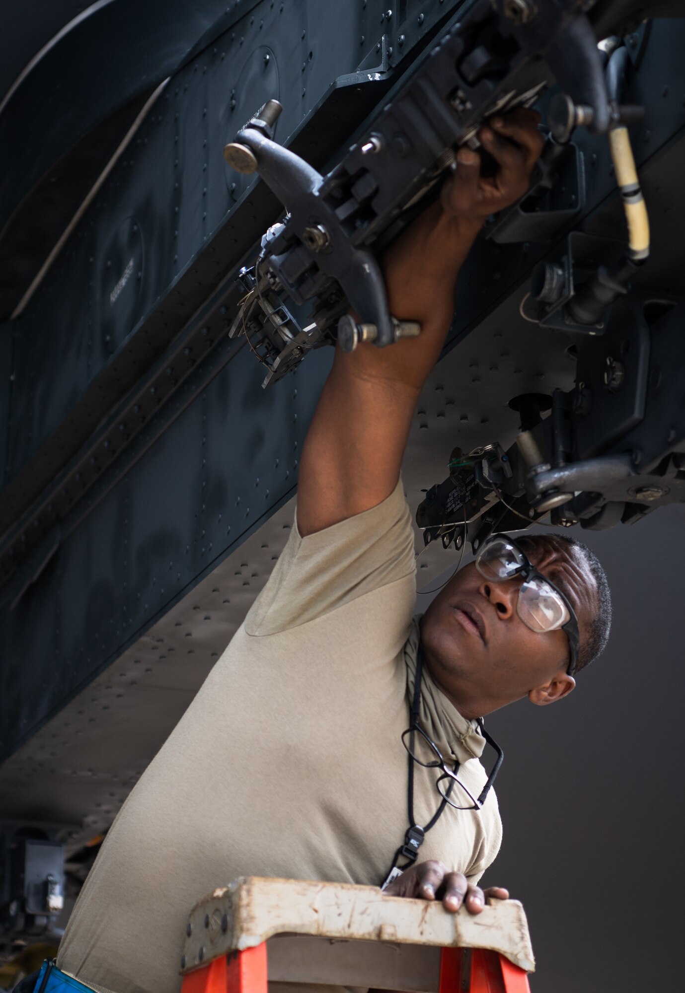 Senior Airman Christian X. Brewer, 2nd Aircraft Maintenance Squadron weapons load crew member, works on a B-52H Stratofortress munitions assembly unit during Combat Hammer at Barksdale Air Force Base, La., March 10, 2021. Participating in exercises like Combat Hammer is important for Airmen of the 2nd Bomb Wing because it allows all facets of the 2nd BW to get repetitions in generating combat power. (U.S. Air Force photo by Airman 1st Class Jacob B. Wrightsman)