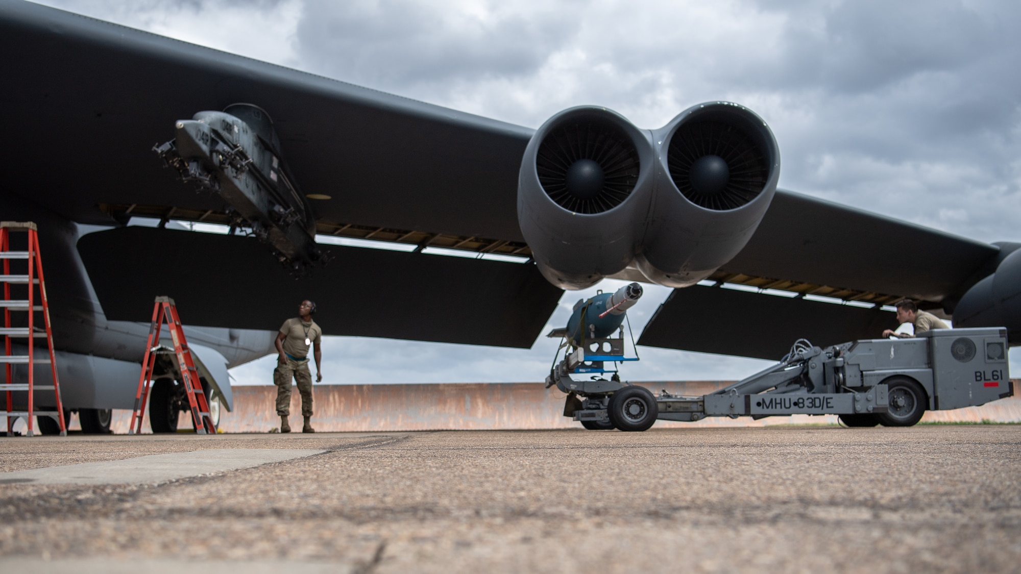 Airman 1st Class Jake W. Wagner, 2nd Aircraft Maintenance Squadron weapons load crew member, transports a GBU-10 muntion to be loaded onto a B-52H Stratofortress during Combat Hammer at Barksdale Air Force Base, La., March10 , 2021. Airmen from the 2nd Bomb Wing loaded and employed nearly 50 types of various munitions and flew a total of eight sorties in support of exercise Combat Hammer. (U.S. Air Force photo by Airman 1st Class Jacob B. Wrightsman)