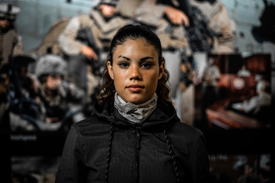 Future Marine recruit Teia Chutaro from Recruiting Sub-Station Honolulu, Recruiting Station San Diego, poses for a photo prior to shipping to recruit training aboard Marine Corps Recruit Depot San Diego, Jan. 5, 2021. Lima Company will be the first integrated company at MCRD San Diego in Marine Corps history. Historically all females who enter the Marine Corps are trained at MCRD Parris Island in South Carolina. (U.S. Marine Corps by Sgt. Tessa Watts)