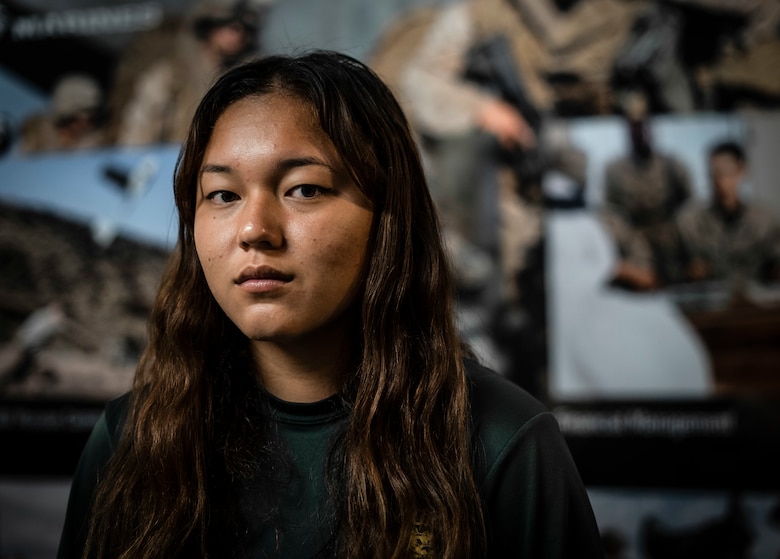 Future Marine recruit Lindsey Rodolfich from Recruiting Sub-Station Honolulu, Recruiting Station San Diego, poses for a photo prior to shipping to recruit training aboard Marine Corps Recruit Depot San Diego, Jan. 5, 2021. Lima Company will be the first integrated company at MCRD San Diego in Marine Corps history. Historically all females who enter the Marine Corps are trained at MCRD Parris Island in South Carolina. (U.S. Marine Corps by Sgt. Tessa Watts)