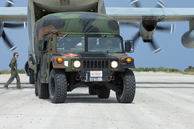 U.S. Marines with 3d Battalion, 12th Marine Regiment, 3d Marine Division, resupply during Castaway 21.1 at Ie Shima, Okinawa, Japan, March 15, 2021. Exercise Castaway 21.1 sought to demonstrate USMC joint capability to seize and secure key maritime terrain, provide low signature sustainment, and execute long range precision fires in support of Naval Operations.