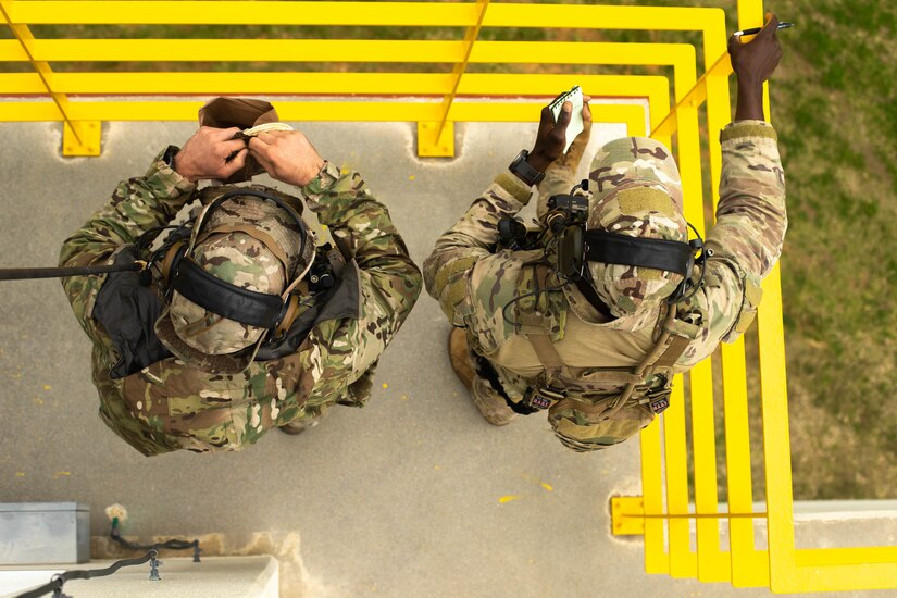 U.S. Air Force combat control specialists with 320th Special Tactics Squadron, conduct close air support during Castaway 21.1 at Ie Shima, Okinawa, Japan, March 13, 2021. The exercise demonstrated the Marine Corps’ ability to integrate with the joint force to seize and defend key maritime terrain, provide low-signature sustainment, and execute long-range precision fires in support of naval operations from an expeditionary advanced base.