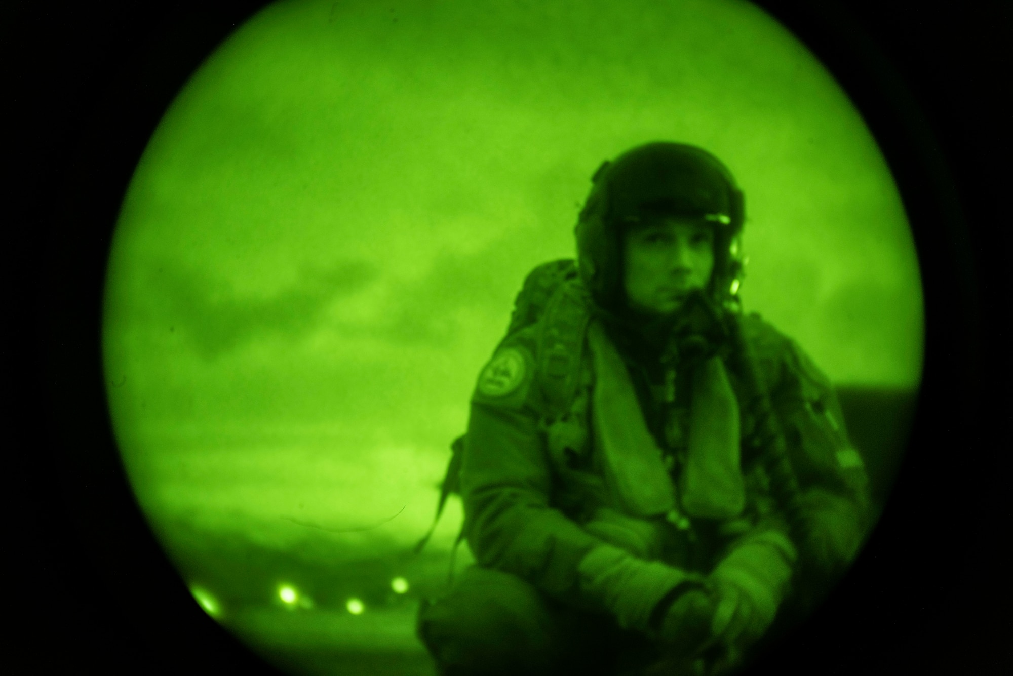 A 9th Expeditionary Bomb Squadron pilot waits to board a B-1B Lancer at Ørland Air Force Station, Norway, March 16, 2021. The 9th EBS deployed to Ørland AFS to conduct a variety of Bomber Task Force missions throughout Europe and the high north. (U.S. Air Force photo by Airman 1st Class Colin Hollowell)