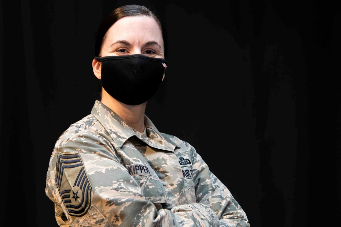 An Airman poses for a photo