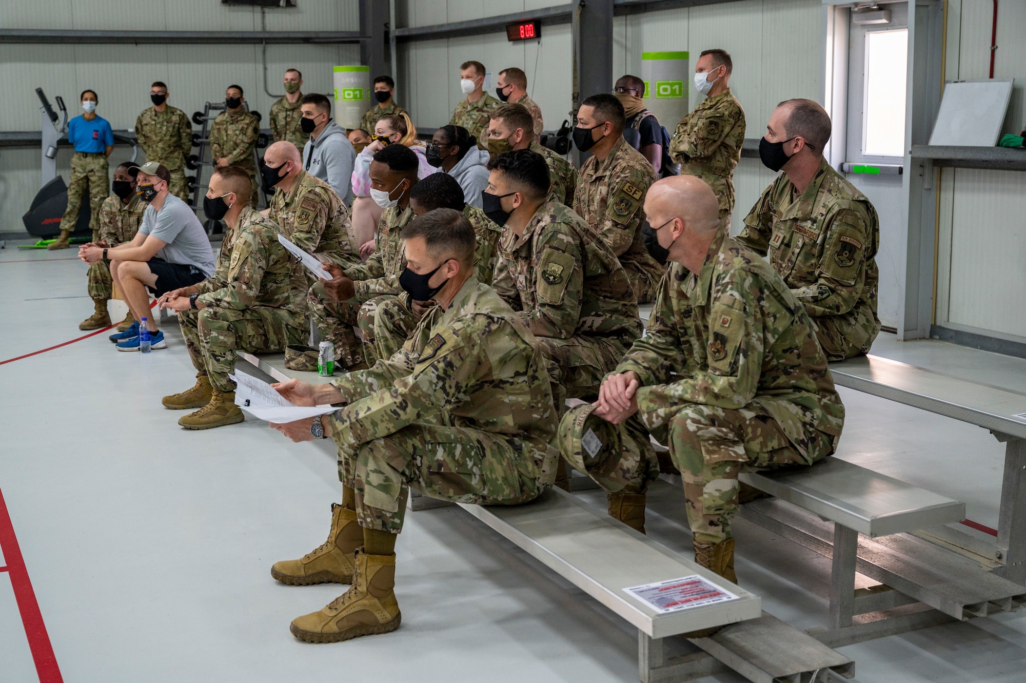 Members of the 380th Air Expeditionary Wing (AEW) receive a COVID-19 vaccine