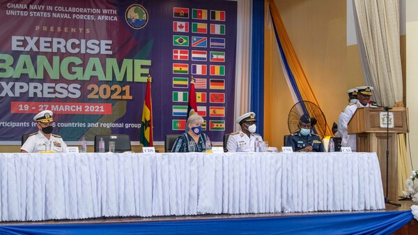 Vice Adm. Seth Amoama, Chief of Defence Staff of the Ghana Armed Forces, right, gives remarks during the opening ceremony for Exercise Obangame Express, March 19, 2021.