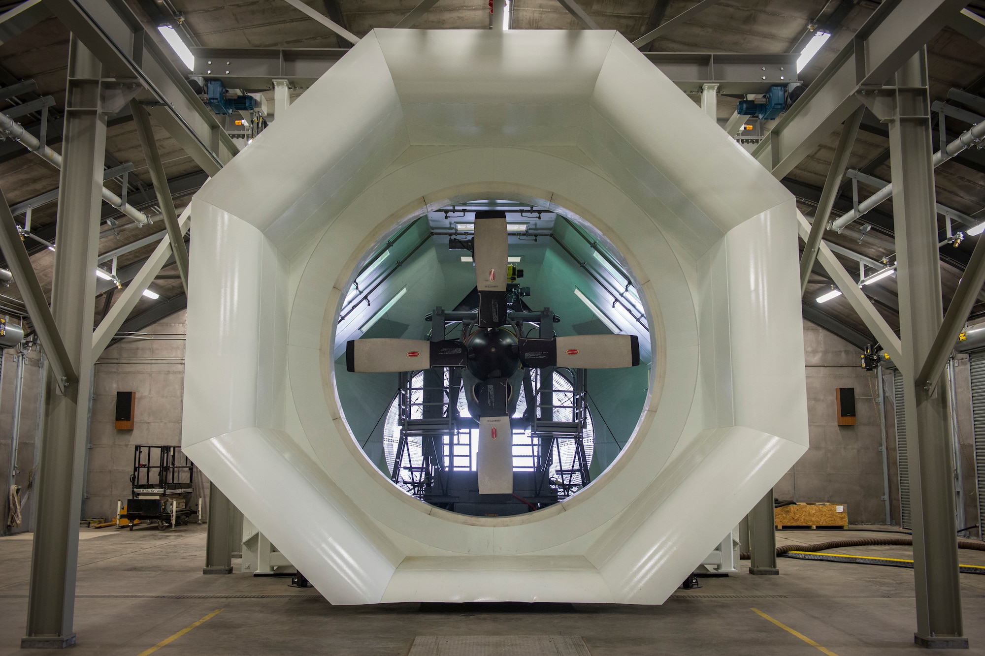 A T56 turboprop engine is mounted to a test cell inside a T-10 Hush House at Bradley Air National Guard Base in East Granby, Connecticut, March 17, 2021. The new facility allows 103rd Maintenance Squadron aerospace propulsion technicians to run engines in a noise-suppressing environment and maximize engine maintenance efficiency for the 103rd Airlift Wing’s fleet of C-130H Hercules aircraft. (U.S. Air National Guard photo by Staff Sgt. Steven Tucker)