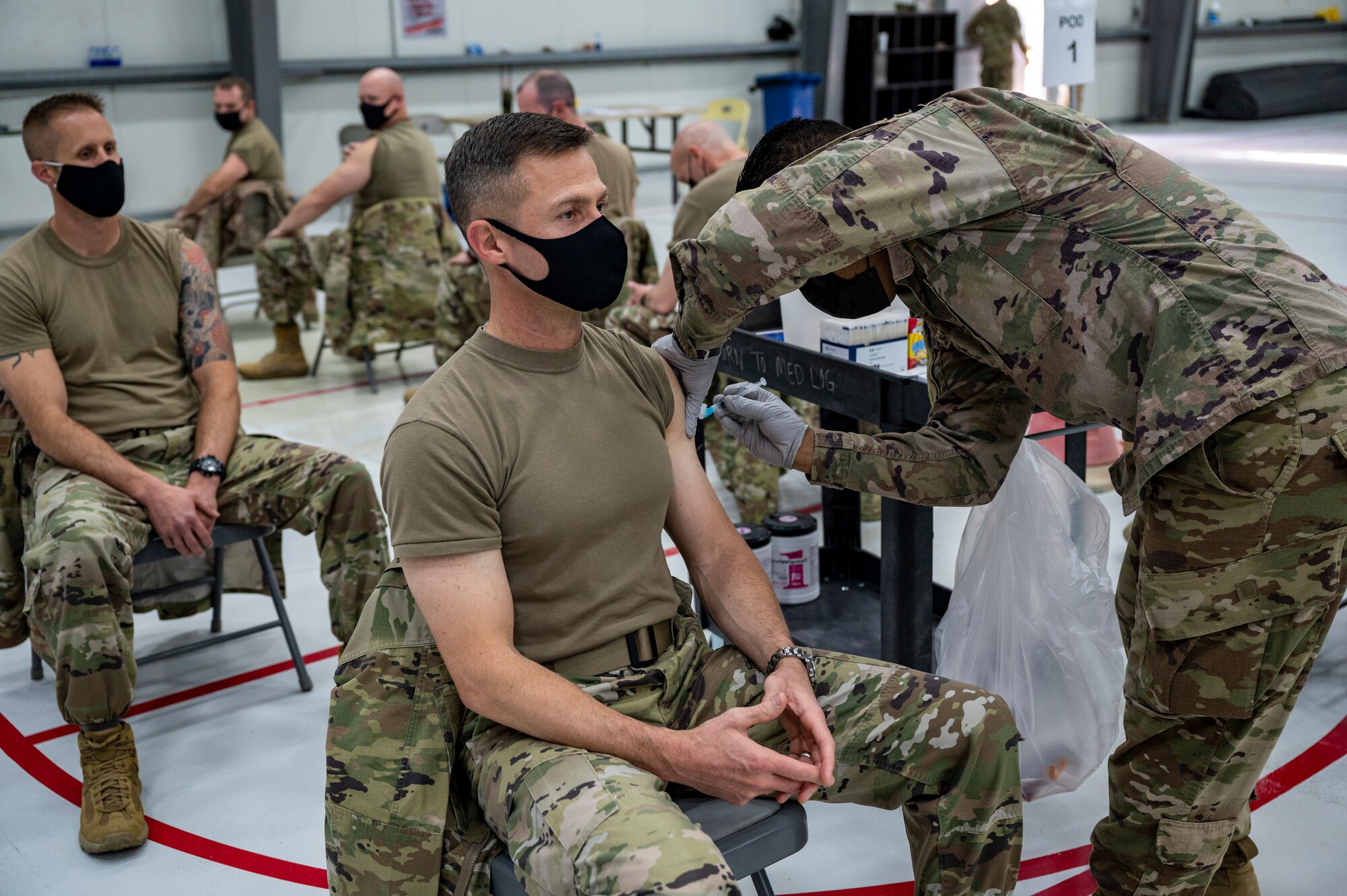 Brig. Gen. Larry Broadwell receives a COVID-19 vaccination