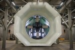 A T56 turboprop engine is mounted to a test cell inside a T-10 Hush House at Bradley Air National Guard Base in East Granby, Connecticut, March 17, 2021. The new facility allows 103rd Maintenance Squadron aerospace propulsion technicians to run engines in a noise-suppressing environment and maximize engine maintenance efficiency for the 103rd Airlift Wing’s fleet of C-130H Hercules aircraft. (U.S. Air National Guard photo by Staff Sgt. Steven Tucker)