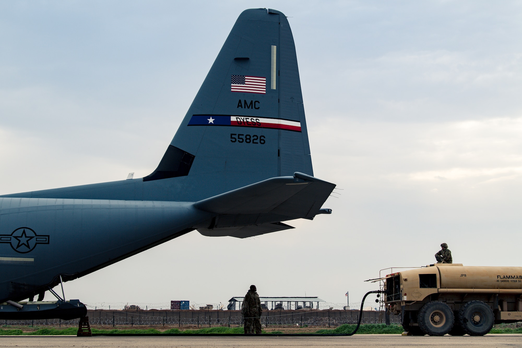 A U.S. Air Force C-130J Super Hercules aircraft, assigned to the 39th Expeditionary Airlift Squadron, delivers fuel to U.S. Soldiers assigned to the 628th Expeditionary Combat Aviation Brigade, Task Force Anvil, through an Aerial Bulk Fuels Delivery System, during a mission in Southwest Asia, March 15, 2021.