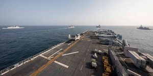 ARABIAN SEA (March 19, 2021) – French Navy frigate FS Provence (D 652), left, U.S. Navy Ticonderoga-class cruiser USS Port Royal (CG 73), left center, French Navy aircraft carrier FS Charles de Gaulle (R 91), right center, Japanese Maritime Self-Defense Force destroyer JS Ariake (DD 109), right, and the amphibious assault ship USS Makin Island (LHD 8) transit the Arabian Sea in support of Gulf Arabian Sea Warfare Exercise (GASWEX) 21. GASWEX 21 is a multilateral maritime exercise in the Arabian Sea and Gulf of Oman, with France, Belgium, Japan, and U.S., which provides a unique opportunity for participating forces to enhance mutual interoperability and capabilities in maritime security, anti-air warfare, anti-surface warfare, and anti-submarine warfare operations, allowing participating naval forces to effectively develop the necessary skills to address threats to regional security, freedom of navigation and the free flow of commerce. (U.S. Navy photo by Mass Communication Specialist 3rd Class Ethan Jaymes Morrow)