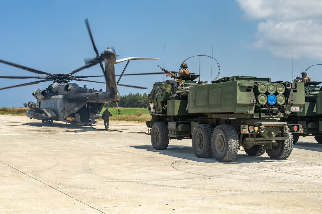 U.S. Marines with 1st Marine Aircraft Wing refuel High Mobility Artillery Rocket Systems with 3d Battalion, 12th Marine Regiment, 3d Marine Division during Castaway 21.1 on Ie Shima, Okinawa, Japan, March 17, 2021. The exercise demonstrated the Marine Corps’ ability to integrate with the joint force to seize and defend key maritime terrain, provide low-signature sustainment, and execute long-range precision fires in support of naval operations from an expeditionary advanced base. (U.S. Marine Corps photo by Lance Cpl. Scott Aubuchon)