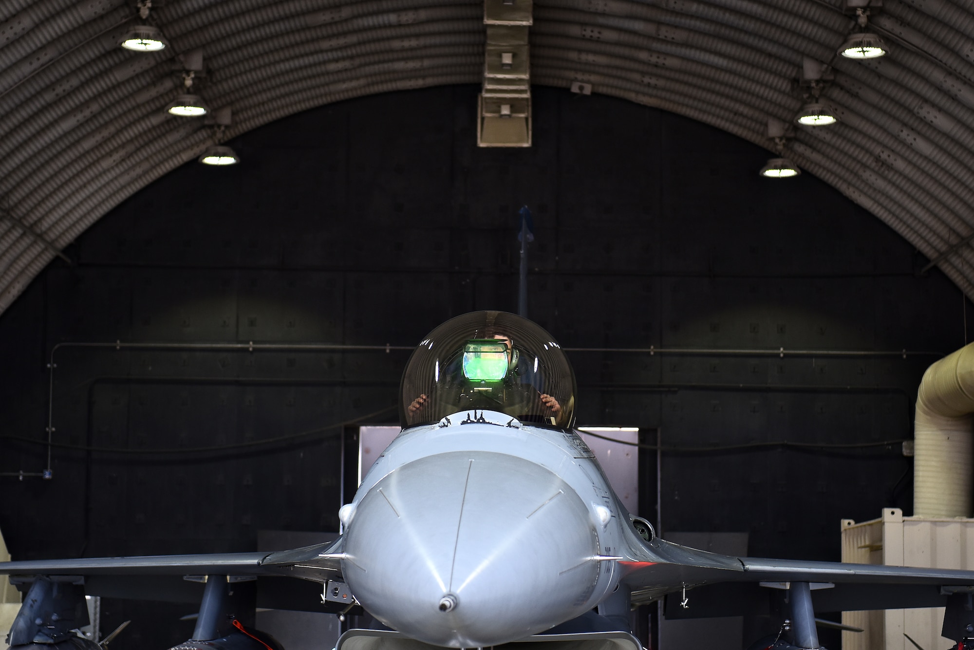 Staff Sgt. Ashley Mounts, 8th Aircraft Maintenance Squadron dedicated crew chief, performs an engine run at Kunsan Air Base, Republic of Korea, March 21, 2021. Crew chiefs inspect, service, clean, and fix aircraft to ensure mission readiness. (U.S. Air Force photo by Senior Airman Suzie Plotnikov)