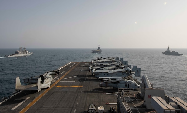 ARABIAN SEA (March 19, 2021) – U.S. Navy Ticonderoga-class cruiser USS Port Royal (CG 73), left, French Navy aircraft carrier FS Charles de Gaulle (R 91), center, Japanese Maritime Self-Defense Force destroyer JS Ariake (DD 109), right, and the amphibious assault ship USS Makin Island (LHD 8) transit the Arabian Sea in support of Gulf Arabian Sea Warfare Exercise (GASWEX) 21. GASWEX 21 is a multilateral maritime exercise in the Arabian Sea and Gulf of Oman, with France, Belgium, Japan, and U.S., which provides a unique opportunity for participating forces to enhance mutual interoperability and capabilities in maritime security, anti-air warfare, anti-surface warfare, and anti-submarine warfare operations, allowing participating naval forces to effectively develop the necessary skills to address threats to regional security, freedom of navigation and the free flow of commerce. (U.S. Navy photo by Mass Communication Specialist 3rd Class Ethan Jaymes Morrow)