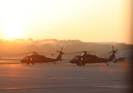 Two D.C. National Guard UH-60 Blackhawk helicopters sit on the tarmac at Davidson Army Airfield prior to an aeromedical support mission 25 April 2020. (US Army Photo by SSG Andrew Enriquez, DC National Guard 715th Public Affairs Detachment)