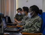 Cmdr. Helen Cann, senior medical officer, participates in a pandemic preparation and response virtual engagement in support of Exercise Obangame Express 2021, March 16, 2021. Obangame Express, conducted by U.S. Naval Forces Africa, is an at-sea maritime exercise designed to improve cooperation among participating nations in order to increase maritime safety and security in the Gulf of Guinea and West African coastal regions.